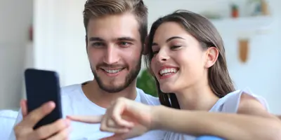 couple playing on the phone