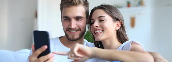 couple playing on the phone