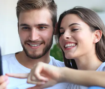 couple playing on the phone